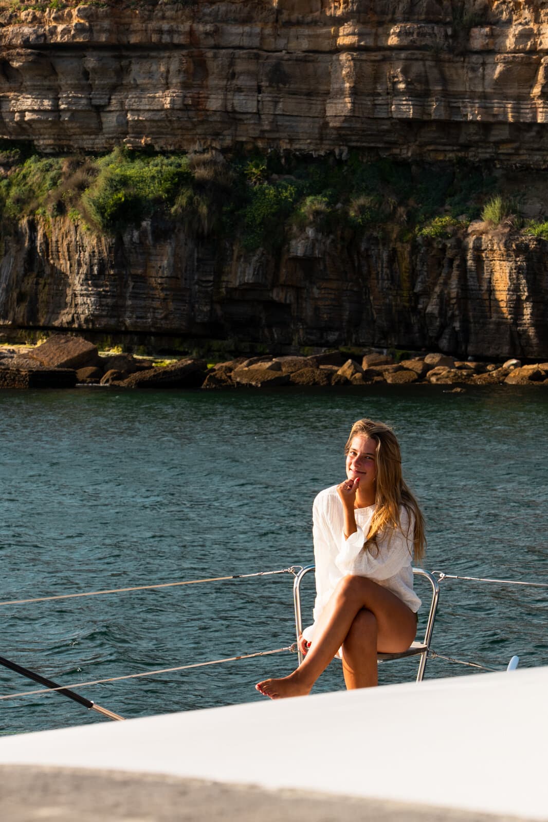 On deck beneath the cliffs